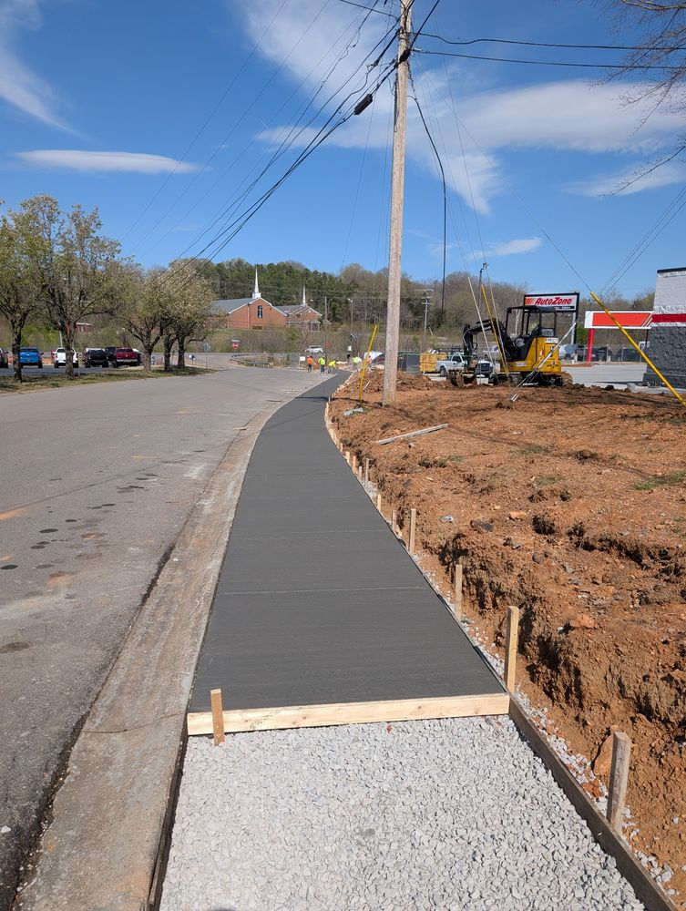 Freshly poured concrete sidewalk on a commercial site in Nashville